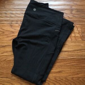 Athleta black leggings with zippers LN